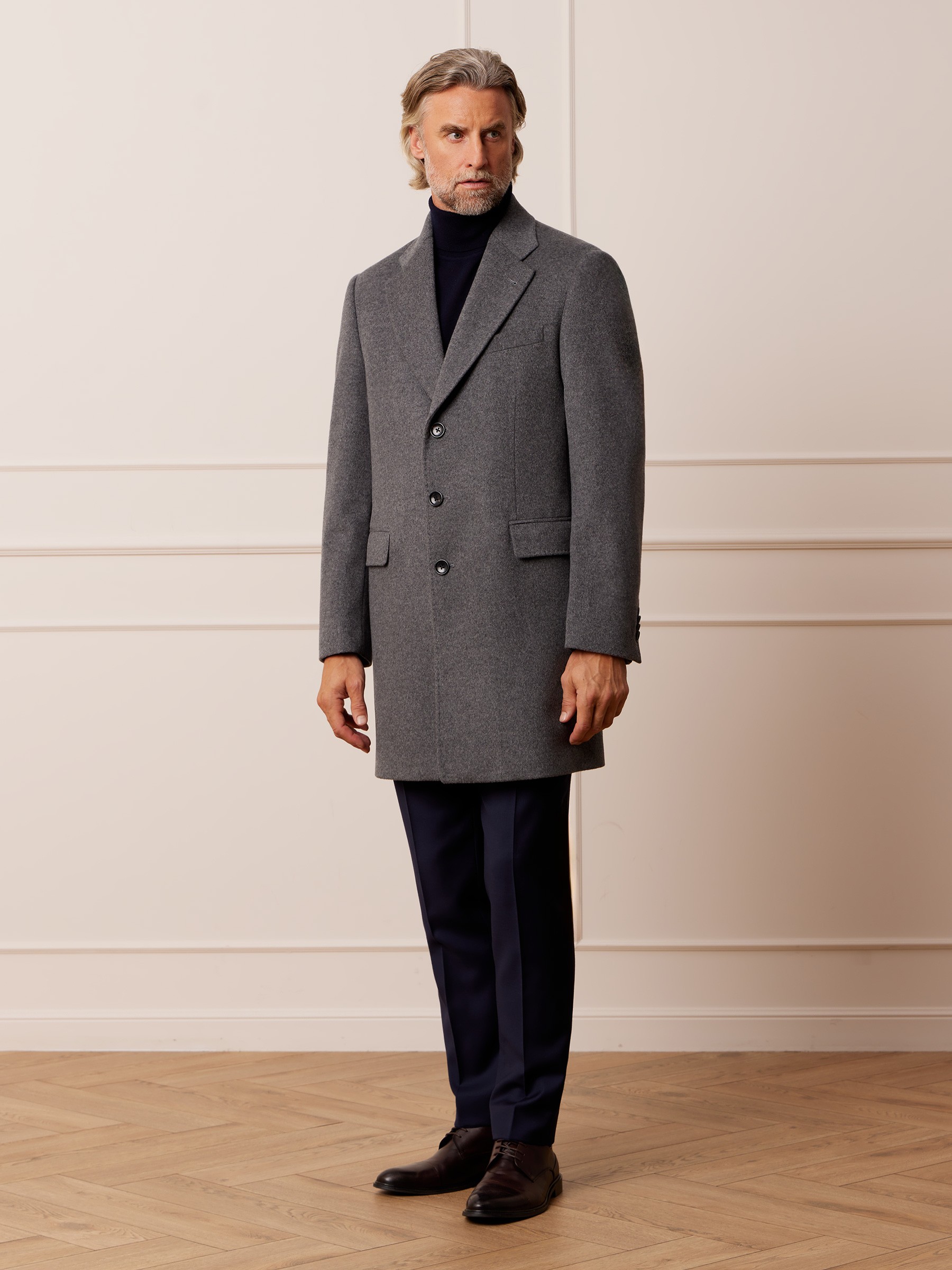 Graphic depicting a color palette of Stone Brown, Dark Navy, Beige, and Cream White along with corresponding hex color codes.