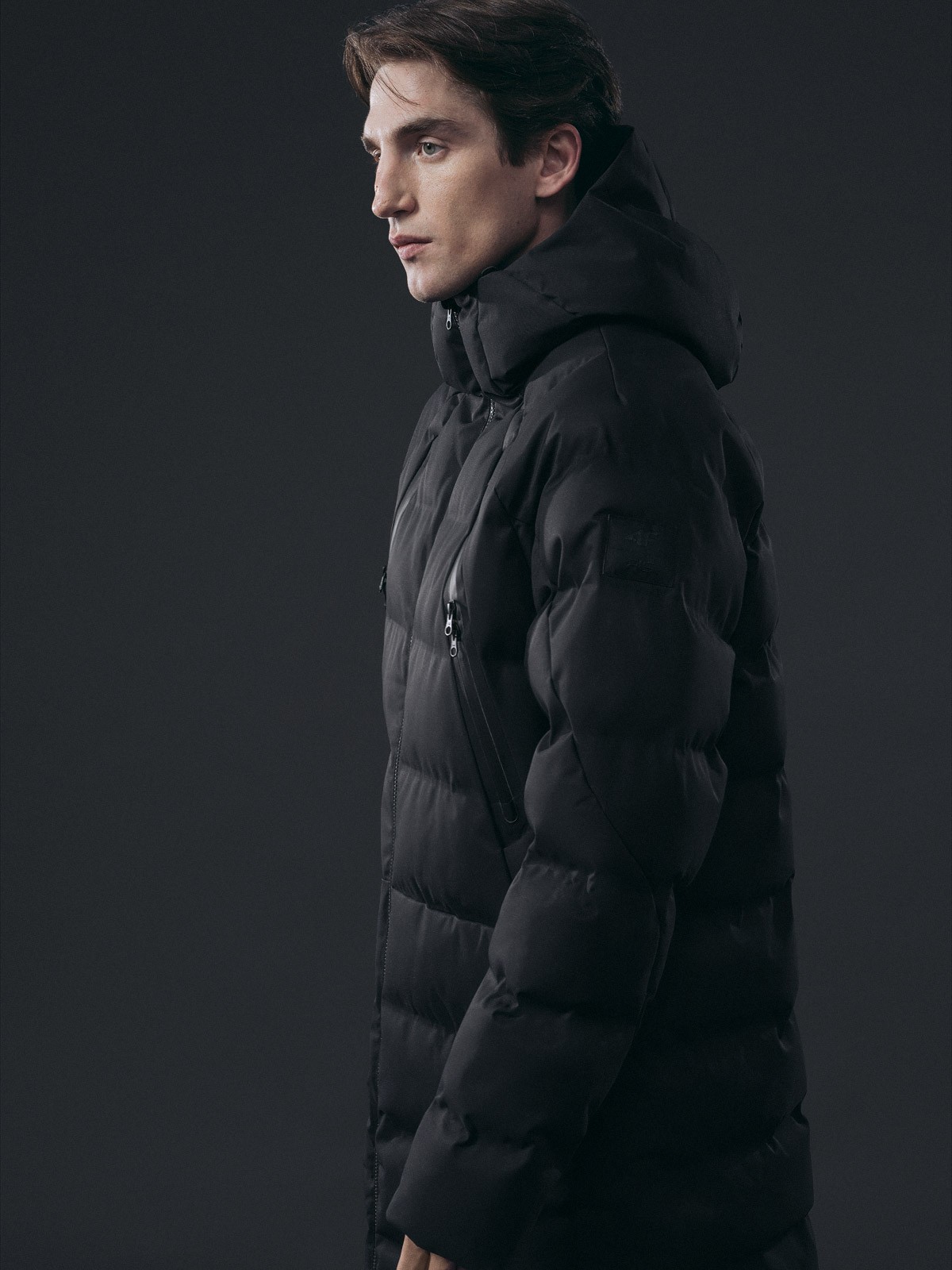 Graphic depicting a hexagonal cropped photo of an interior room design with grid lines along its borders.