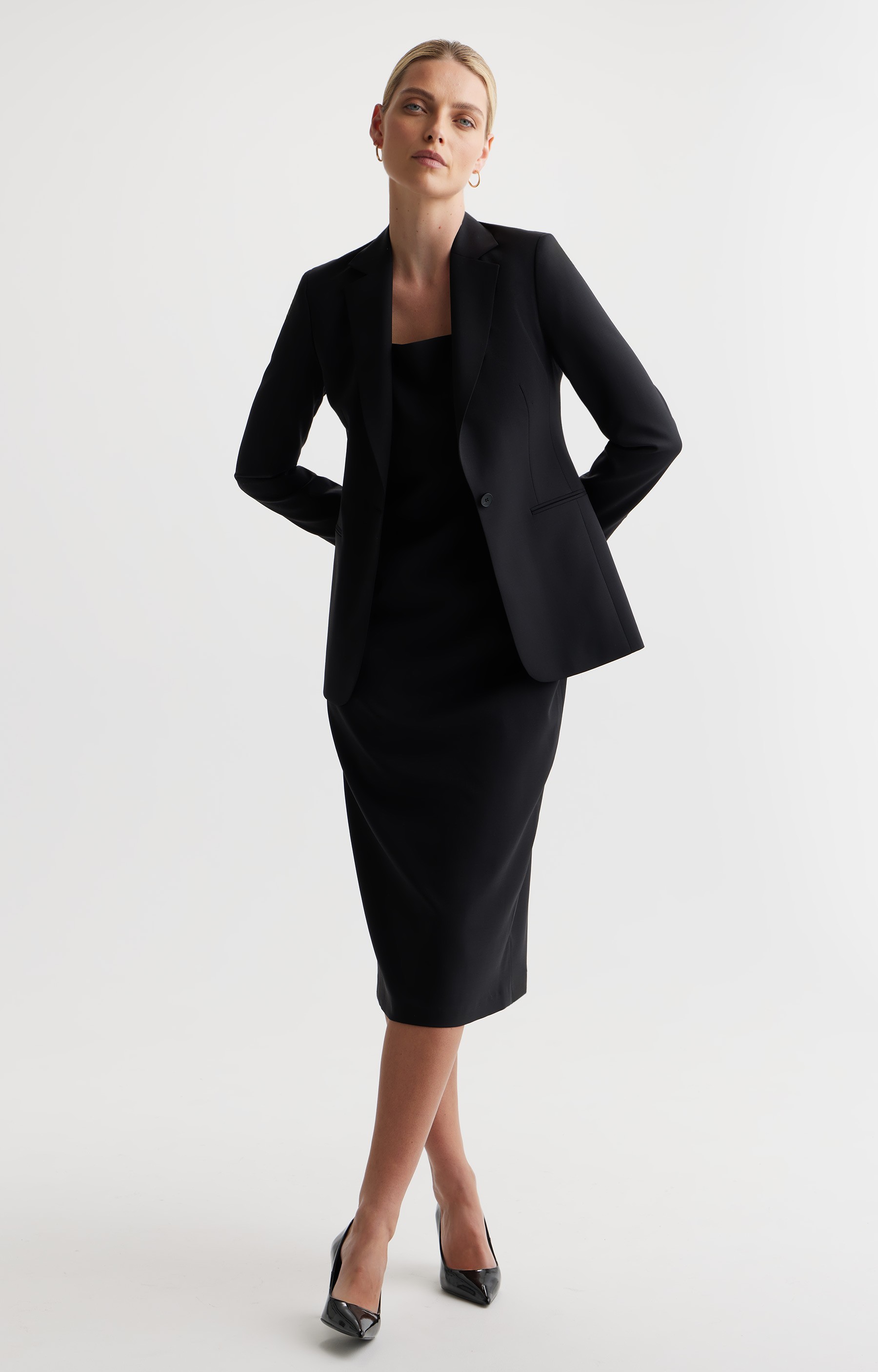 Graphic depicting a hexagonal cropped photo of an interior room design with grid lines along its borders.