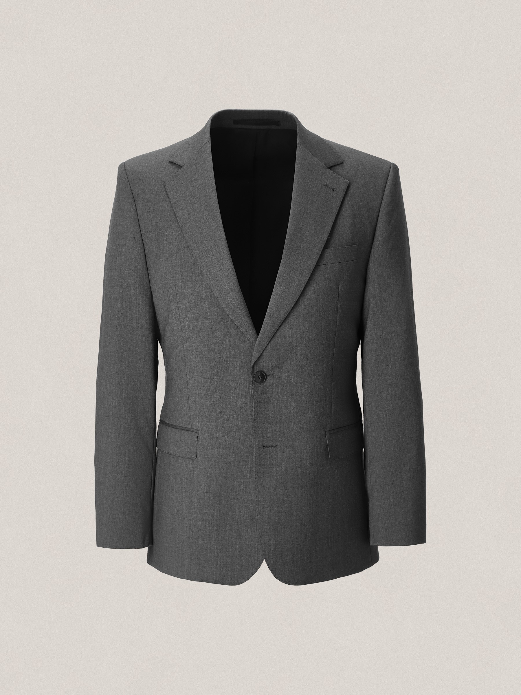 Graphic of a typography specimen showing the alphabet and numerals on top of a dark gray background.