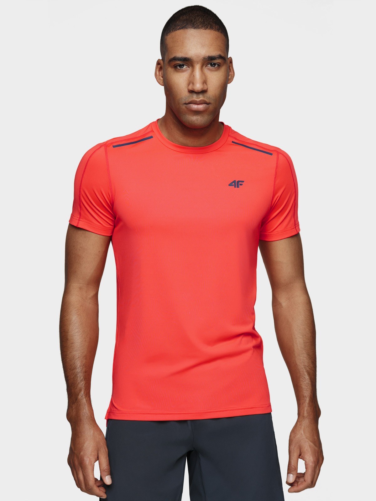 Graphic of a typography specimen showing the alphabet and numerals on top of a dark gray background.