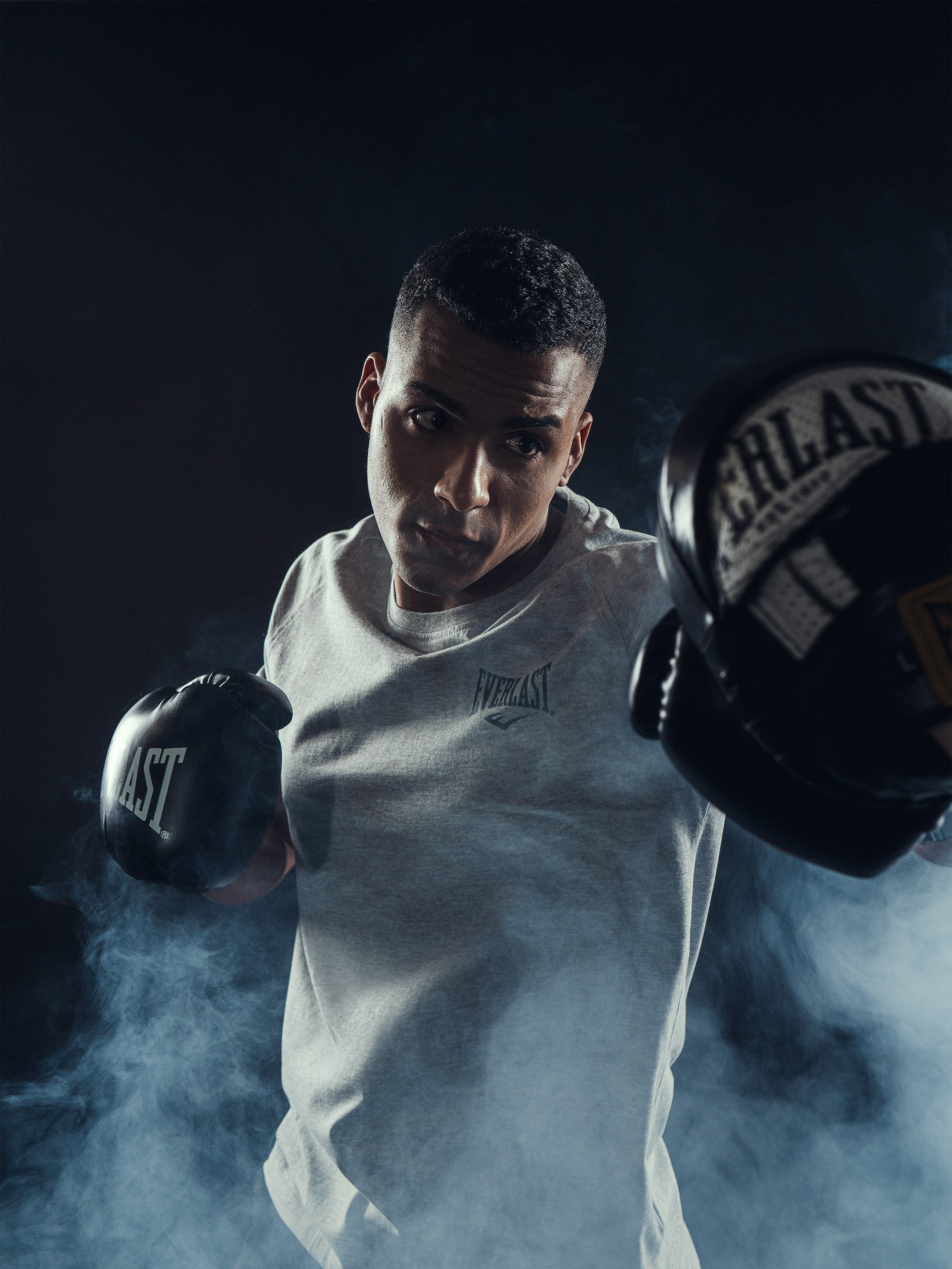 Graphic depicting a hexagonal cropped photo of an interior room design with grid lines along its borders.